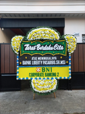 Papan Bunga Duka di Molanikime