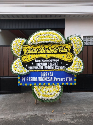 Papan Bunga Duka di Molanikime