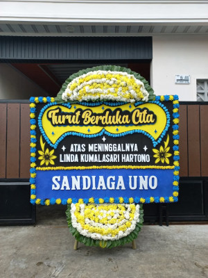 Papan Bunga Duka di Molanikime