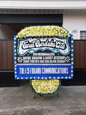 Papan Bunga Duka di Molanikime
